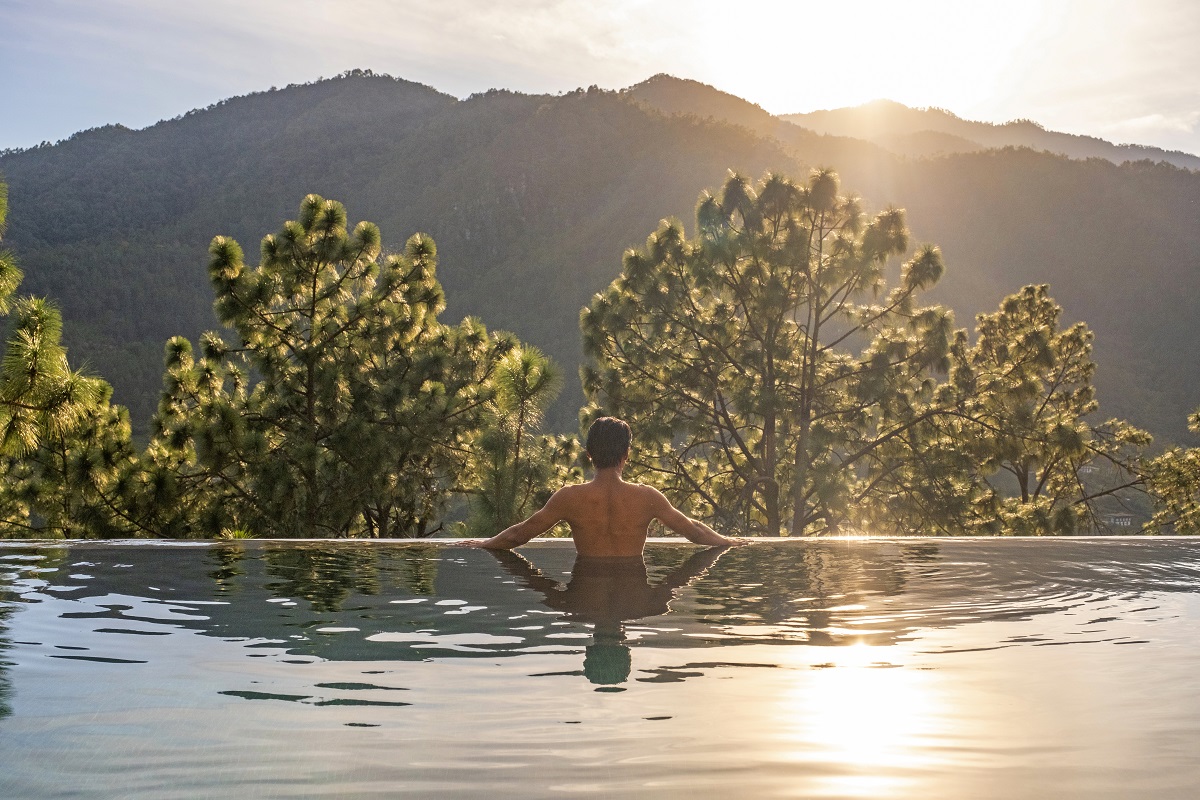 view from Private temperature controlled Pool looking across Bhutan muntain landscape