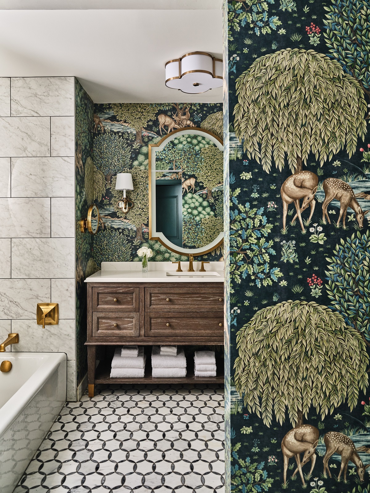 William Morris wallpaper on wall leading into the bathroom at the Inn on Biltmore