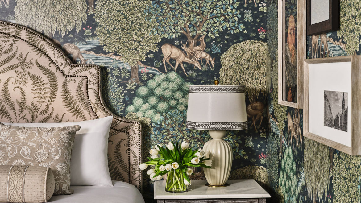 bedroom detail at The Inn on Biltmore with morris wallpaper and upholstered bedhead - design by ROAM