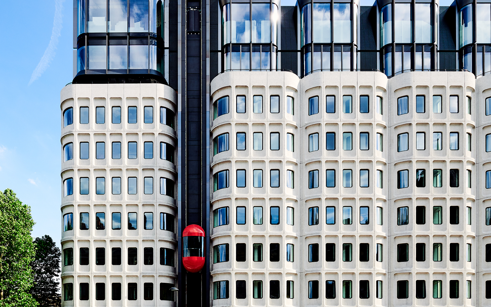 facade of The Standard London with red lift