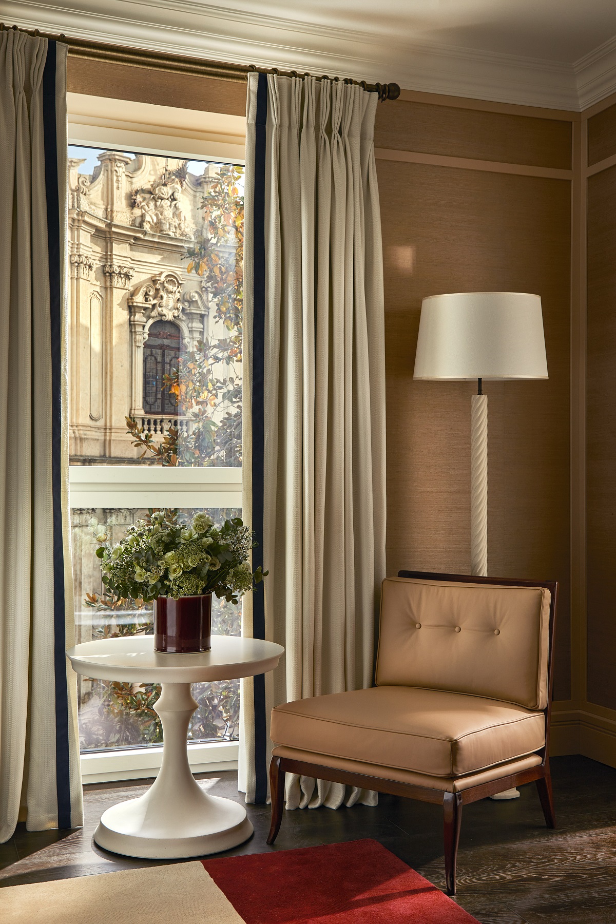 chair, lamp and table with Milan street view