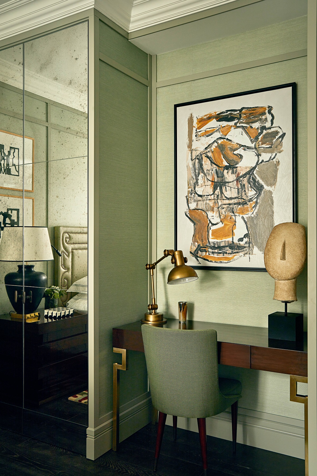 mirrored wall and contemporary art in deluxe room at The Carlton Mila Rocco Forte Hotels