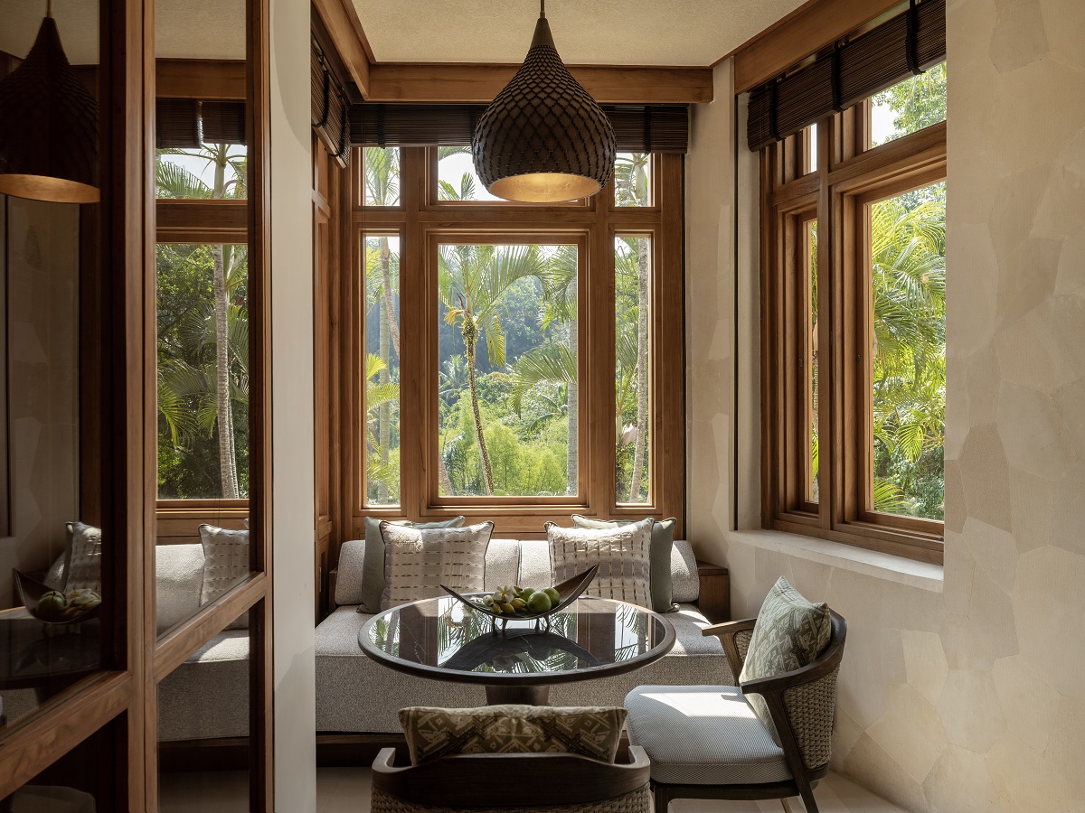 searing around window with jungle views SUITE - PREMIER DUPLEX SUITE LIVING ROOM