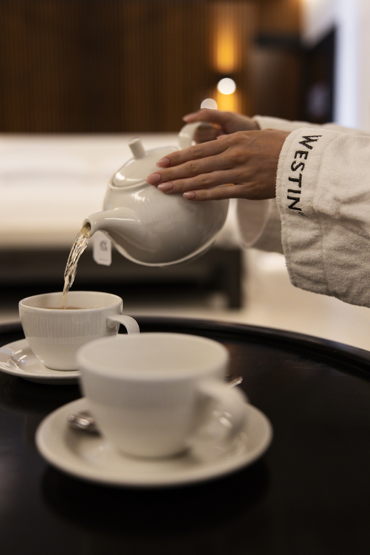 detail of pouring tea at The Westin Maldives Miriandhoo Resort - as part of the Sleep Well ritual