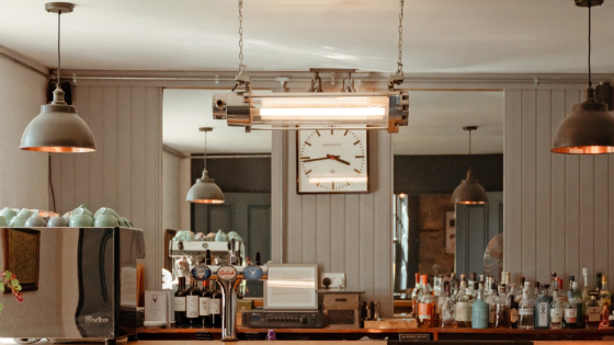 vintage lighting from Loomlight over retro bar and coffee station photo credit @suiehuntinglodge