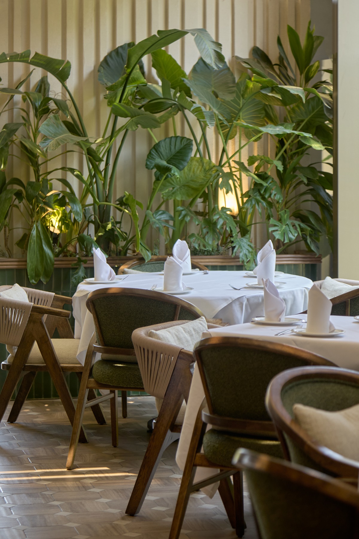 tropical planting in the restaurant Puerto Prendes reflect colour palette