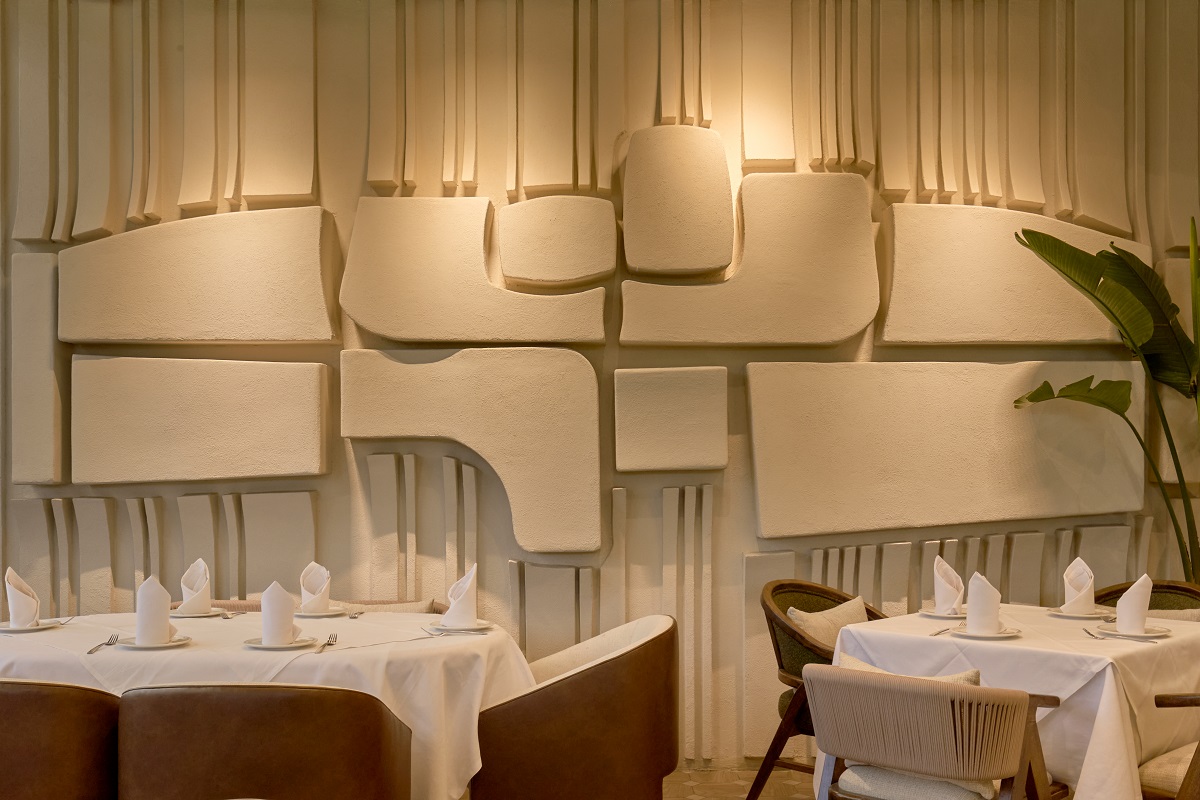 detail of cream on white organic wall design by Talo Atelier in Puerto Prendes