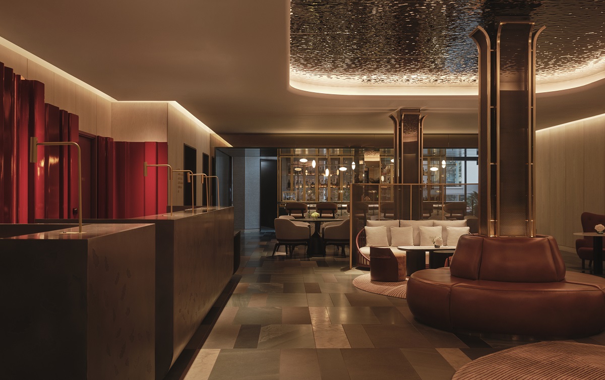 the lobby lounge with seating below reflective ceiling design by Conran and PArtners in Taj Hotel St James