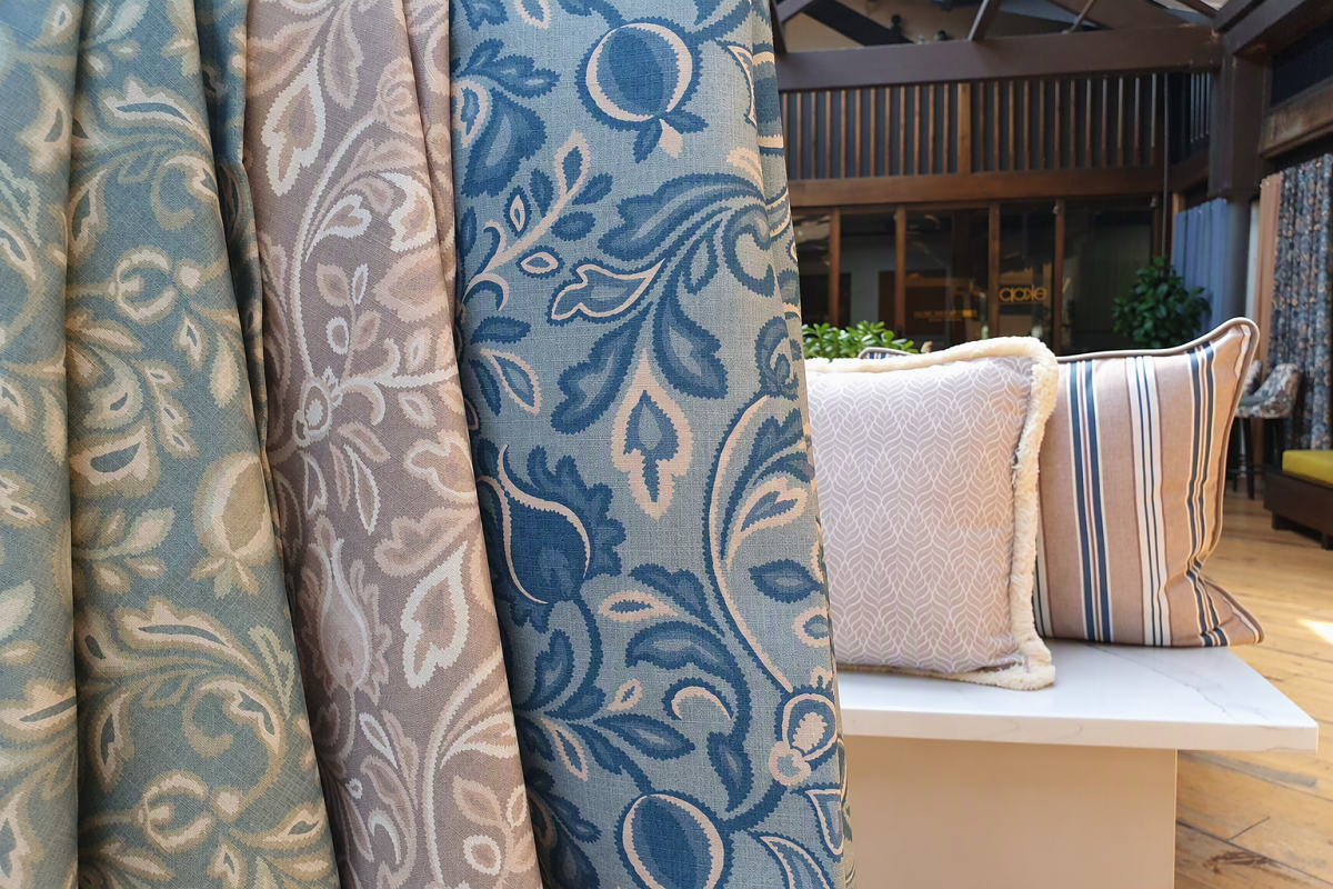 Antheia and Maranta fabrics as curtain samples in the Skopos showroom
