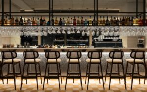row of chairs in front of lobby bar in Ruby Lilou France