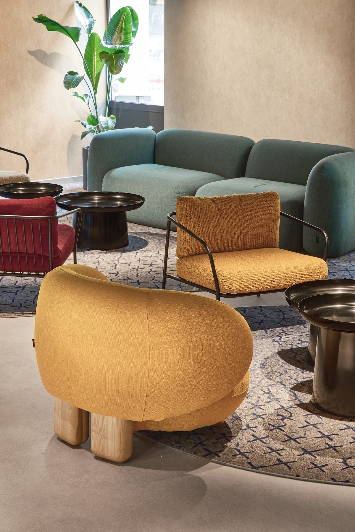yellow grey and burgundy seating in soft organic shapes