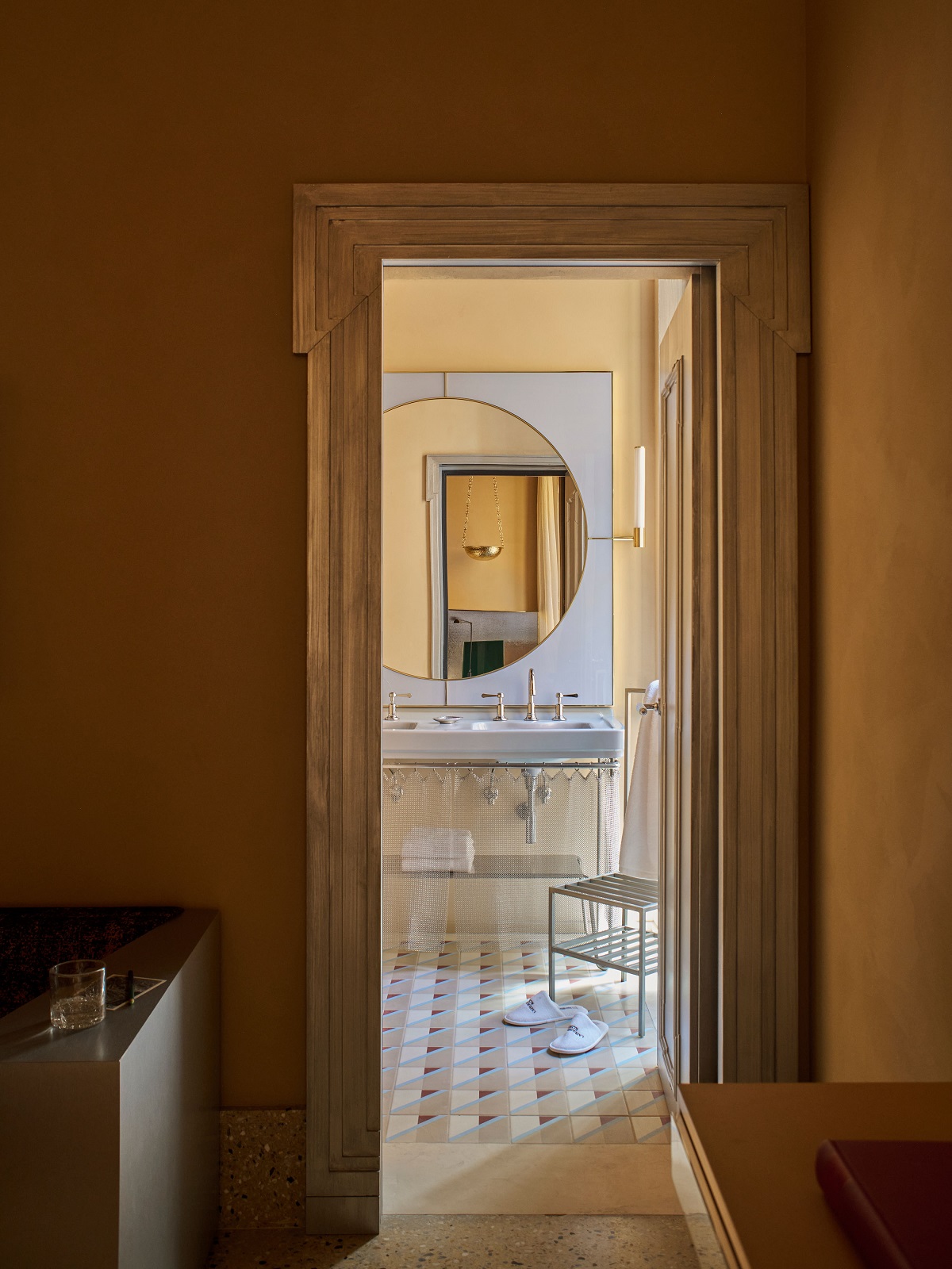 view into bathroom framed by door