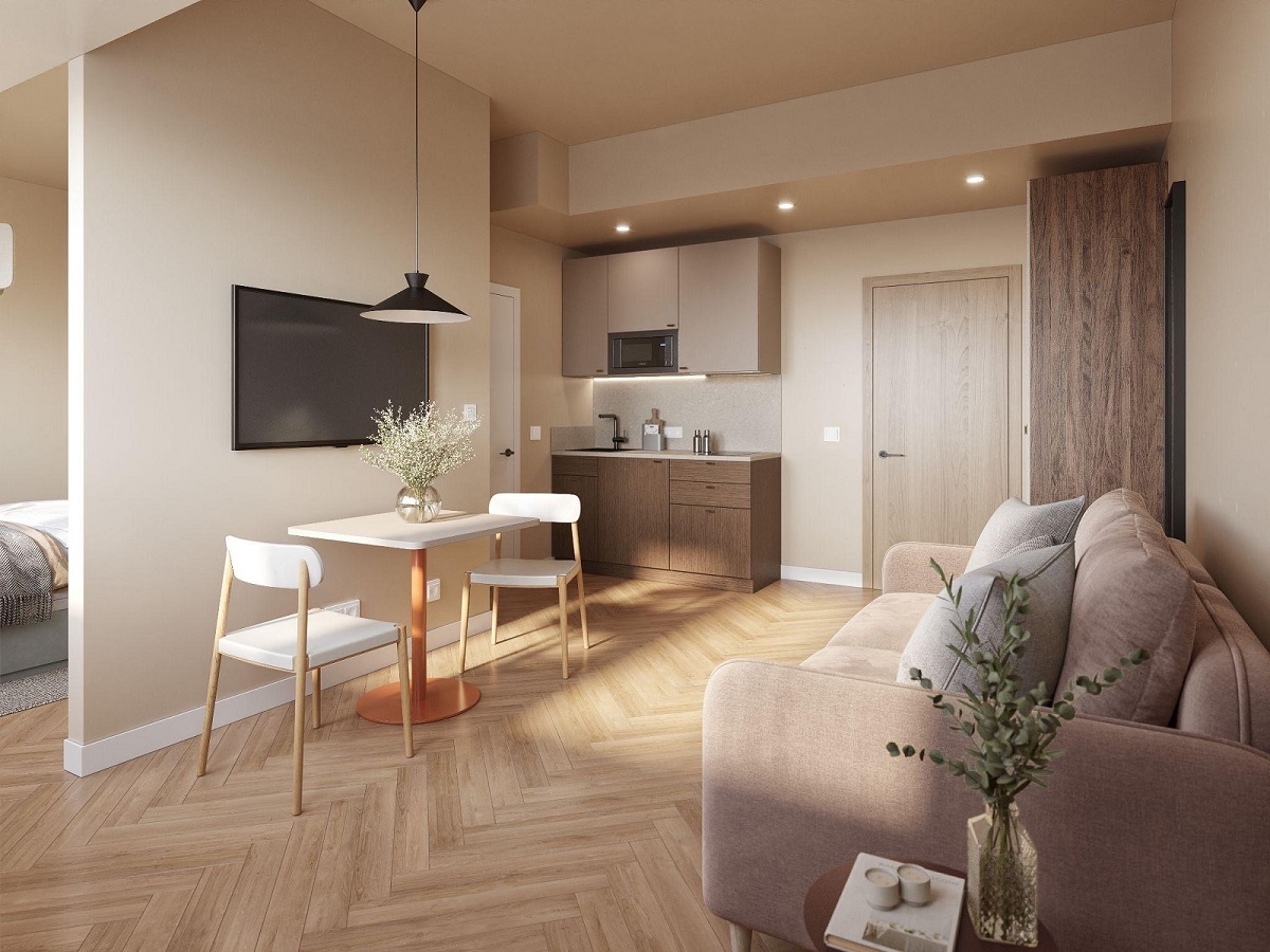 kitchen and seating area alongside bedroom in Bob W Berlin