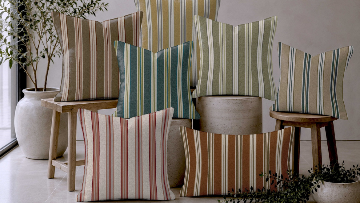 a pile of striped cushions in Poole stripe from Skopos