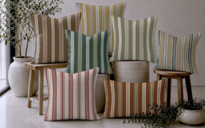a pile of striped cushions in Poole stripe from Skopos