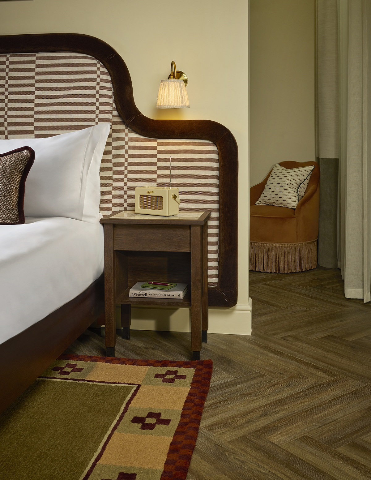 bedhead detail in the Hoxton Dublin with rug under the bed by Pelican House