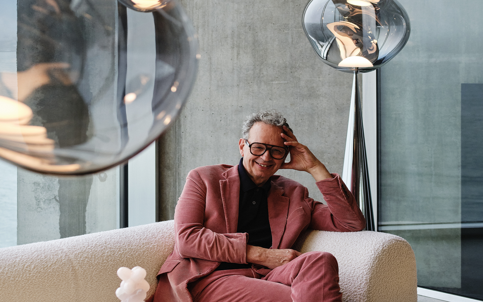 designer Tom Dixon on a couch discussing SANIPEX collaboration