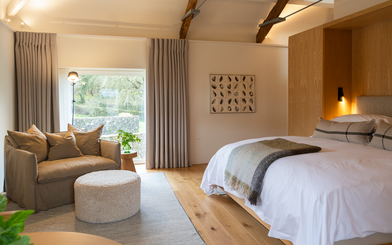 Fowlescombe Farm guestroom with view to countryside and farm