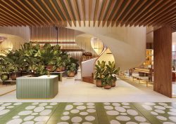 green tiles, wood ceiling and green plants in the lobby of ME Málaga
