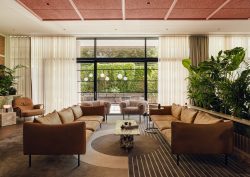 lounge seating, leather sofa, patterned rug in PURO Poznan