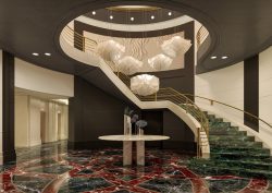 sweeping staircase and statement lighting in sofitel New York