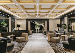 coffered ceiling and striped carpet in Sofitel New York