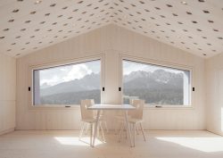 pale timber minimalist interior of Italian alpine cabin Atto