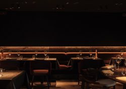 dark walls and back lit seating in Cult Bruges