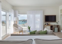 guestroom in Melia La Palma in shades of white and cream with dual aspect sea views