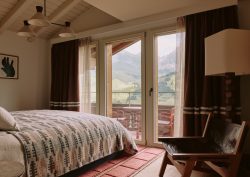 guestroom in The Brecon with views on to the swiss alps from the bed