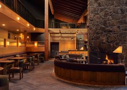 wood and stone interior surfaces in the Trailborn Jackson Hole_Lobby_Credit Christian Harder, Courtesy of Tra