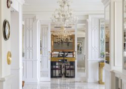 pillars and chandeliers leading from entrance of Londra Palace Venezia