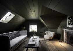 black wood panelling in an attic room in Lundies House in Scotland