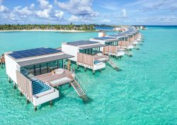 aerial image of SOMaldives over-water bungalows