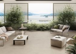 tiled outdoor floor with view across bay and islands