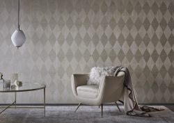 decorative wallcovering from Fameed Khalique behind styled chair and table with flowers