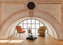 curved stone window detail with chairs and table in the bar at Locke St Joana