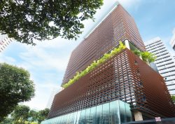 exterior view of COMO Metropolitan Singapore looking up at building from the street