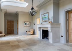 Ca Pietra Cote Bourgogne limestone floor from Hyperion tiles in entrance hall with fireplace