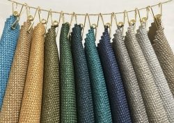 celeste fabric samples from Skopos pegged to a cord on display