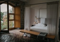 suite in susafa hotel in sicily with windows opening onto the countryside