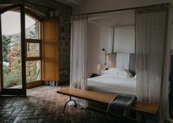 suite in susafa hotel in sicily with windows opening onto the countryside
