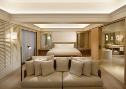 wood cream and beige interior in guestroom at Conrad Orchard Singapore