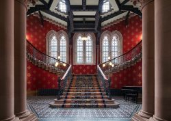 stairway and stained glass windows in St Pancras hotel London