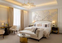 gold, cream and white design in guestroom of Corinthia Grand Hotel du Boulevard Bucharest