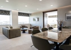 dining table, couch and seating from BoConcept in hotel room with skyline views