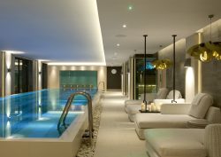 Dormy House spa with raised pool and loungers