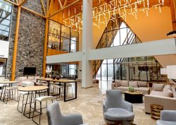 hotel lobby double volume in a-frame style design DoubleTree by Hilton Nathiagali