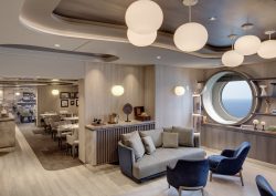 Interior design scheme that is contemporary in Med Yacht Club restaurant onboard Explora 1