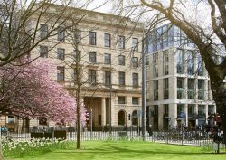 city park and front facade of Edinburgh Grand